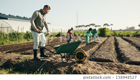 Man, farming and wheelbarrow on land, healthy food and sustainability in eco friendly agriculture. Diversity, work and africa compost in ngo farm startup in ecology, health soil and field to plant 138948527