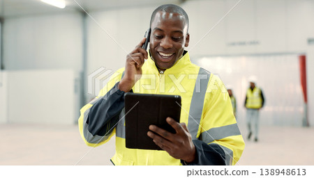 Happy black man, engineer and phone call with tablet for communication, networking or discussion at warehouse. African male person, architect or contractor smile on mobile smartphone for conversation Happy black man, engineer and phone call with tablet for communication, networking or discussion at warehouse. African male person, architect or contractor smile on mobile smartphone for conversation 138948613