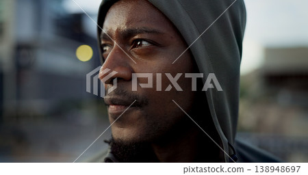 Morning exercise, face and thinking, black man in city on rest from wellness workout in hoodie. Relax, breathing and African athlete on calm urban fitness with fatigue, reflection and outdoor air. Morning exercise, face and thinking, black man in city on rest from wellness workout in hoodie. Relax, breathing and African athlete on calm urban fitness with fatigue, reflection and outdoor air. 138948697