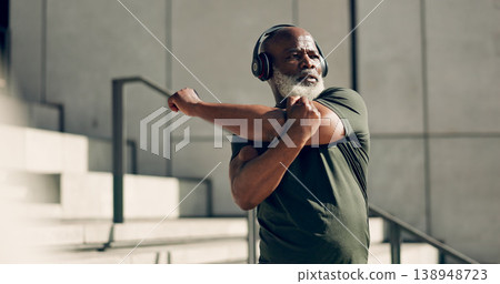 Fitness, headphones and senior black man stretching in city, workout and exercise for body health. Music, serious athlete and warm up on steps or stairs in urban town, listening to audio and thinking 138948723