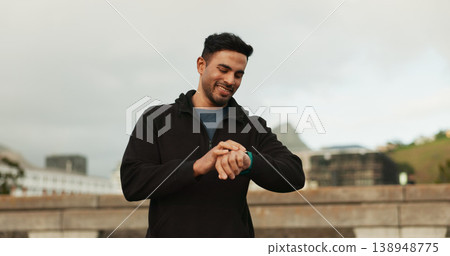 Smart watch, happy and man in city for exercise, cardio fitness and healthy training progress. Indian runner check stopwatch for timer, heart rate and workout performance, clock and results outdoor 138948775