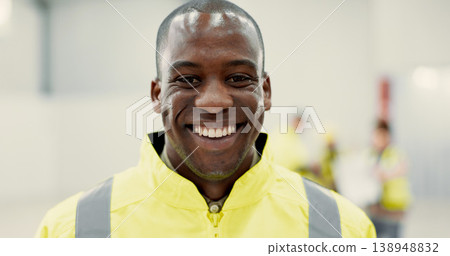 Smile, happy and portrait of black man construction worker standing with confidence in a warehouse. Positive, pride and young African industrial employee at an indoor site for maintenance or repairs. 138948832