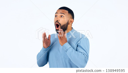 News, announcement and man with surprise on face in studio, white background or mockup space. Wow, emoji and excited or shocked person with secret, drama or hearing crazy information on promotion News, announcement and man with surprise on face in studio, white background or mockup space. Wow, emoji and excited or shocked person with secret, drama or hearing crazy information on promotion 138949595