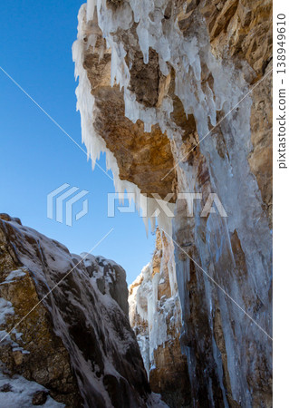 Icicles on the rocks 138949610