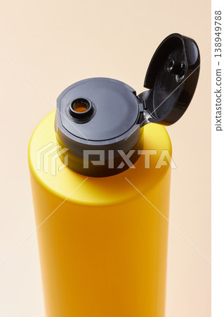 Open Yellow Flip Top Cosmetic Bottle 138949788