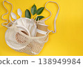 Reusable bag with eco friendly tableware and leaves 138949984