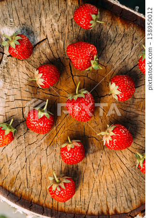 Strawberries. Ripe Strawberry Organic Berries. Juicy Fresh Red Strawberries On An Old Birch Stump Strawberries. Ripe Strawberry Organic Berries. Juicy Fresh Red Strawberries On An Old Birch Stump 138950012