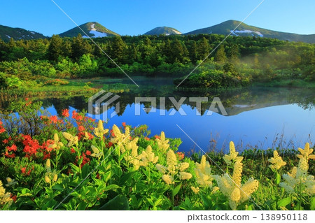 The inverted Hakkoda Mountains reflected in the pond The inverted Hakkoda Mountains reflected in the pond 138950118
