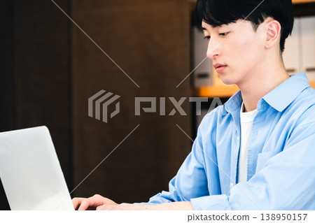 Businessman using a personal computer Businessman using a personal computer 138950157
