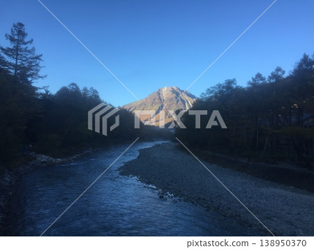 Mount Yake, illuminated by the morning sun in early winter. Mount Yake, illuminated by the morning sun in early winter. 138950370