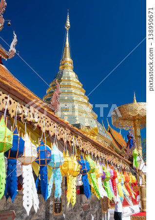 Golden stupa of Wat Phra That Doi Suthep temple in Thailand, richly decorated Buddhist structure with statues and ornate details, spiritual landmark in Chiang Mai Golden stupa of Wat Phra That Doi Suthep temple in Thailand, richly decorated Buddhist structure with statues and ornate details, spiritual landmark in Chiang Mai 138950671