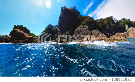 008_Iwate Prefecture: The unusual rock formations of Kitayamazaki and the wake of a small fishing boat sailing across the Pacific Ocean [September] 138951983