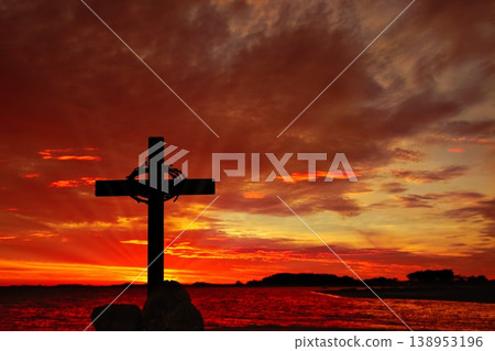 Cross With Crown of Thorns Blood Red Sunset Sky Cross With Crown of Thorns Blood Red Sunset Sky 138953196
