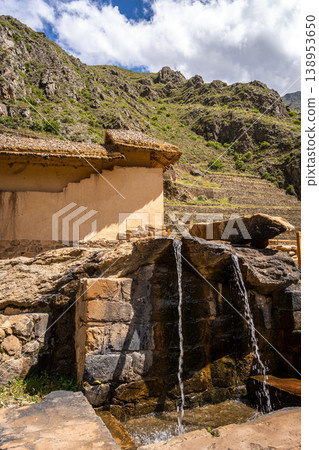 Ancient Inca fountain at the fortress of Ollantaytambo in Peru Ancient Inca fountain at the fortress of Ollantaytambo in Peru 138953650