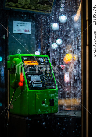 A phone booth in Ebisu on a rainy night A phone booth in Ebisu on a rainy night 138953740