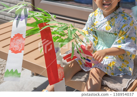Children making wishes for Tanabata Children making wishes for Tanabata 138954037