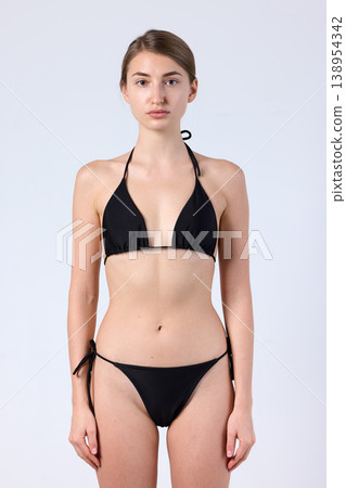 Studio Swimwear Model Front View Straight Pose Studio Swimwear Model Front View Straight Pose 138954342