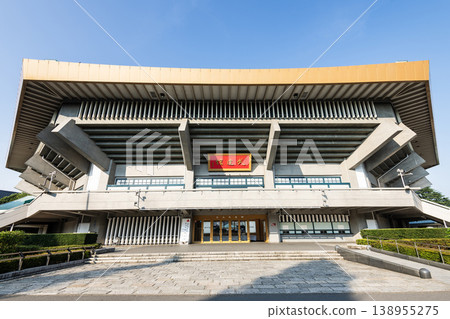 Building view of the Nippon Budokan, it is an indoor arena in Kitanomaru Park, Chiyoda, Tokyo, Japan. Building view of the Nippon Budokan, it is an indoor arena in Kitanomaru Park, Chiyoda, Tokyo, Japan. 138955275