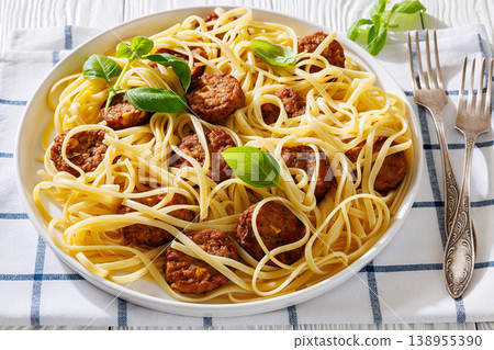Pasta linguine with meatballs, pesto sauce, lemon Pasta linguine with meatballs, pesto sauce, lemon 138955390
