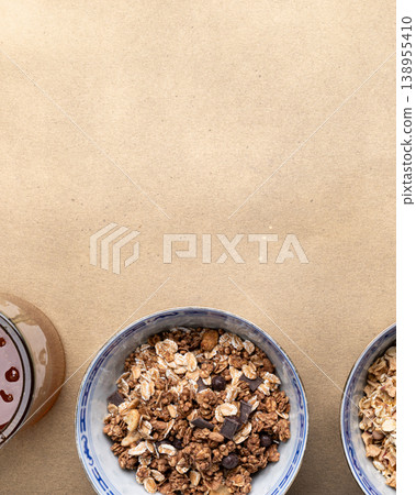 Granola bowls with oats chocolate caramel Granola bowls with oats chocolate caramel 138955410