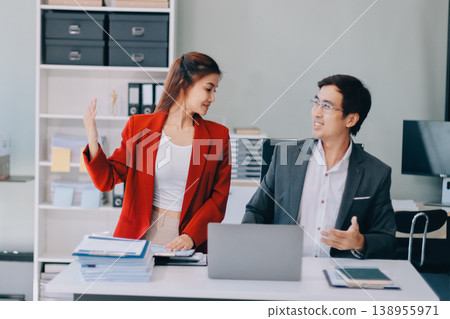 Group of business people and software developers working as a team in office 138955971