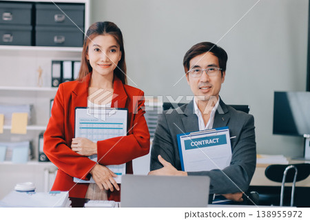Group of business people and software developers working as a team in office 138955972