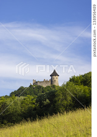 Salgotarjan Castle standing on hill against blue sky Salgotarjan Castle standing on hill against blue sky 138956489