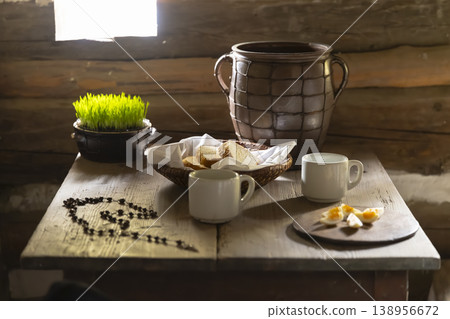 Rustic table setting with Easter grass and rosary Rustic table setting with Easter grass and rosary 138956672