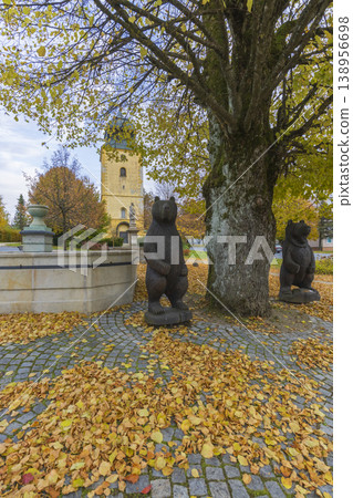 Wooden bear sculptures in Primda town square during autumn Wooden bear sculptures in Primda town square during autumn 138956698