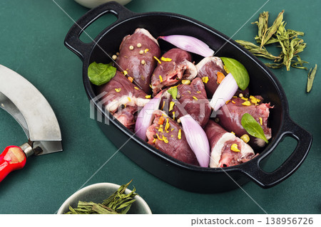 Uncooked turkey hearts with herbs Uncooked turkey hearts with herbs 138956726