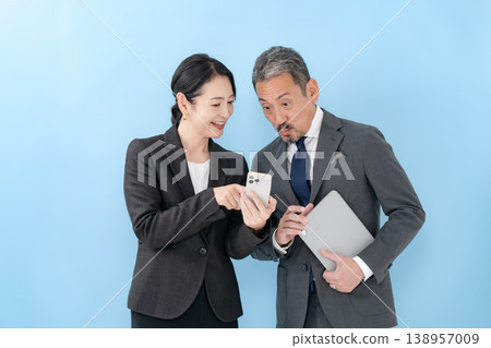Business conversation between men and women (search) 138957009