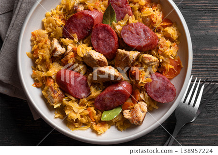 Polish Bigos meal or Hunter's stew with sausages, meat and cabbage Polish Bigos meal or Hunter's stew with sausages, meat and cabbage 138957224