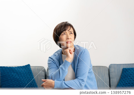 Worried senior woman Worried senior woman 138957276