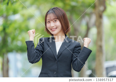 Business woman outdoor fist pump 138957317