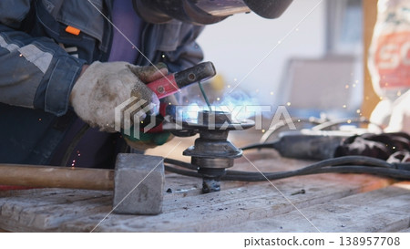 Angle Grinder Producing Bright Sparks While Cutting Steel, Dynamic Motion Captured On Workbench, Hands Controlling Tool, Gritty Workshop Light And Tactile Industrial Texture Conveying Steady Angle Grinder Producing Bright Sparks While Cutting Steel, Dynamic Motion Captured On Workbench, Hands Controlling Tool, Gritty Workshop Light And Tactile Industrial Texture Conveying Steady 138957708