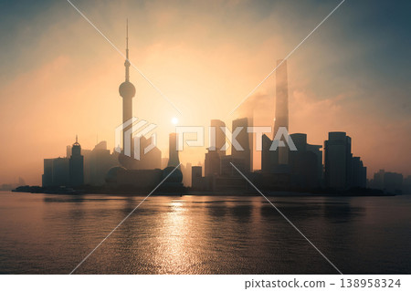 Foggy sunrise over Shanghai skyline with Oriental Pearl Tower and financial skyscraper in Pudong district Foggy sunrise over Shanghai skyline with Oriental Pearl Tower and financial skyscraper in Pudong district 138958324