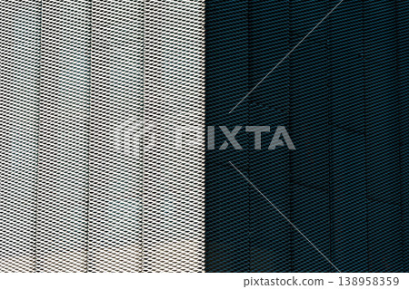 Modern perforated metal mesh texture surface with high contrast composition Modern perforated metal mesh texture surface with high contrast composition 138958359
