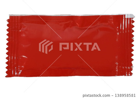 Red plastic condiment sachet isolated on transparent background. 138958581
