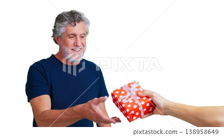 Happy senior man receiving present from unknown person 138958649