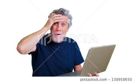 Senior man realizing a mistake while using laptop 138958650