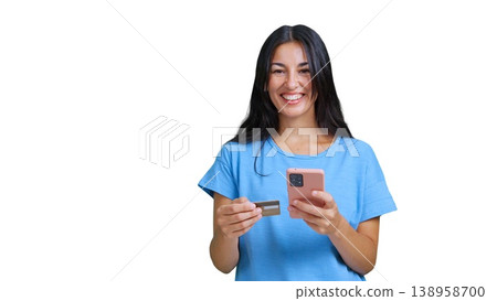 Woman smiling holding credit card and smartphone online shopping Woman smiling holding credit card and smartphone online shopping 138958700