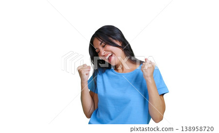 Happy woman celebrating success joyfully with fists pump Happy woman celebrating success joyfully with fists pump 138958720