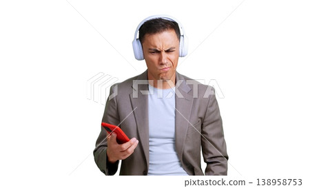 Man listening to music feeling confused or frustrated Man listening to music feeling confused or frustrated 138958753