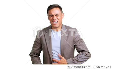 Man suffering from severe abdominal pain having indigestion Man suffering from severe abdominal pain having indigestion 138958754
