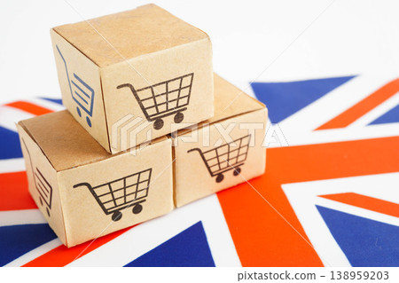 Online shopping, Shopping cart box on United Kingdom flag, import export, finance commerce. Online shopping, Shopping cart box on United Kingdom flag, import export, finance commerce. 138959203