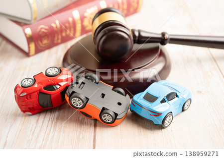 Bangkok, Thailand March 15, 2023 Car accident lawsuit and insurance, Judge hammer with car model. 138959271