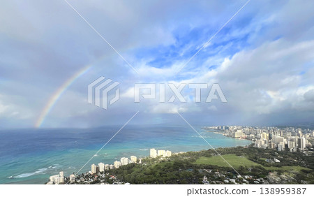A view from Diamond Head in Hawaii and a rainbow over the ocean in Waikiki. 138959387