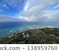 A view from Diamond Head in Hawaii and a rainbow over the ocean in Waikiki. 138959760