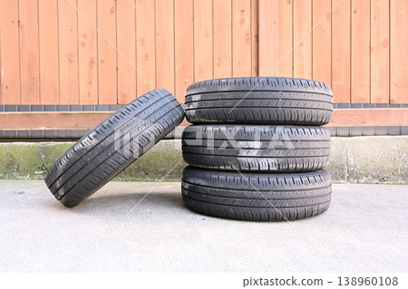 Normal tires stored in the garage Normal tires stored in the garage 138960108