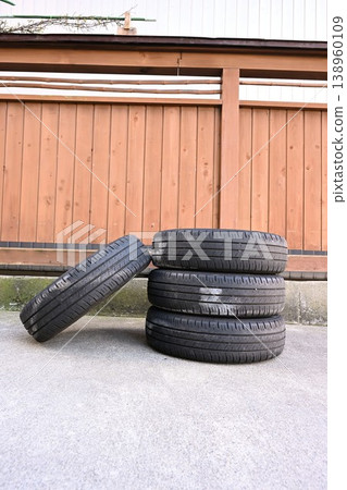 Normal tires stored in the garage Normal tires stored in the garage 138960109